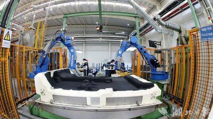 日特固汽车蔡甸工厂全速运转 12条生产线满负荷生产，为汽车产业注入强劲动能